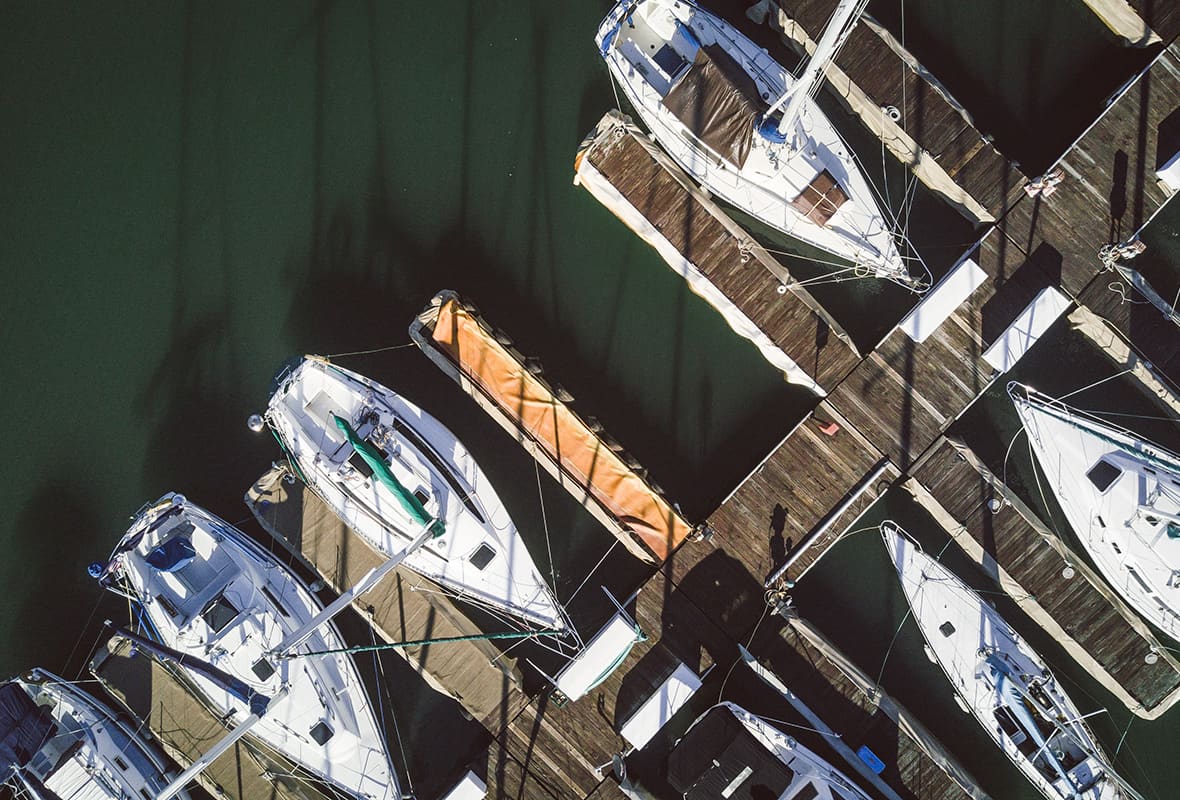 Boats docked at marina