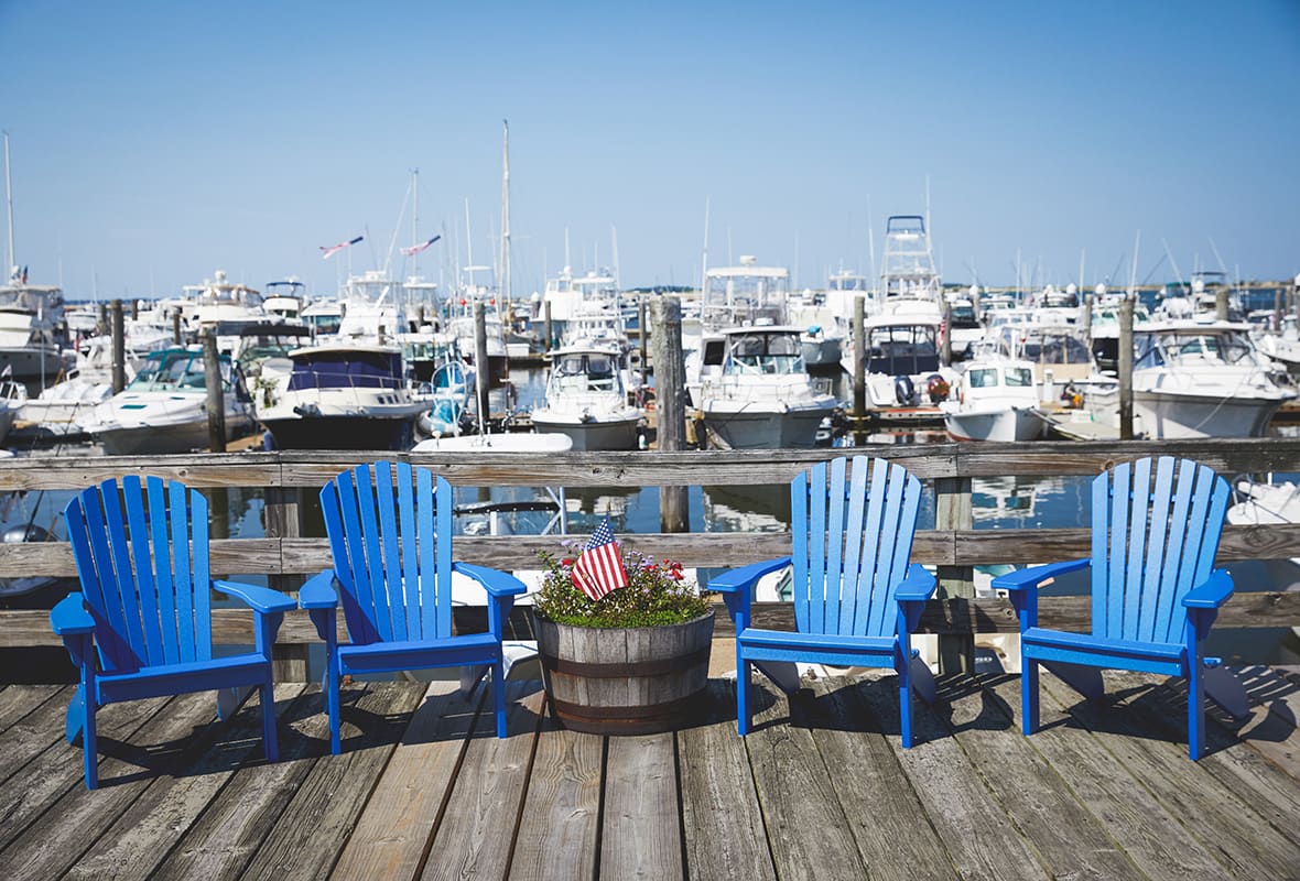 Blue chairs on dock