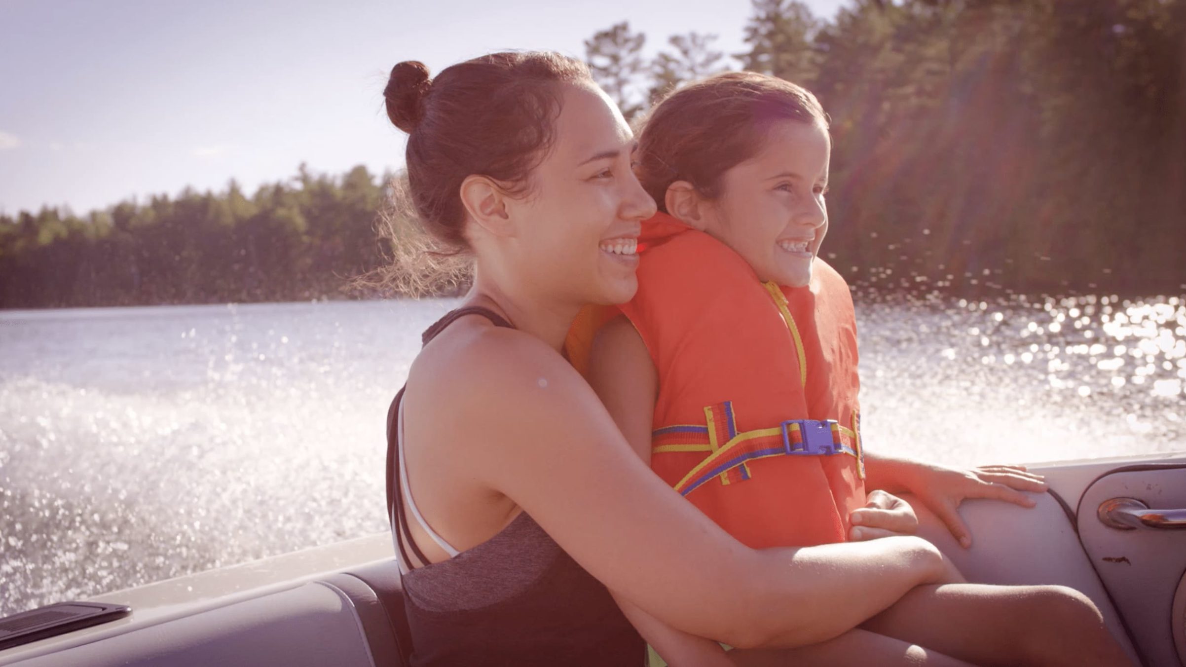 Mom and daughter on a boat ride