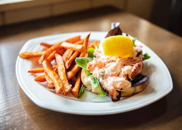 seafood sandwich and fries