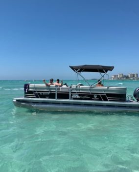 pontoon boat on clear water