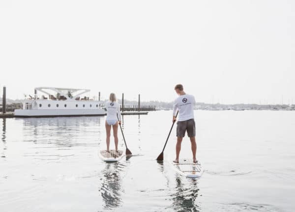 two people paddleboarding