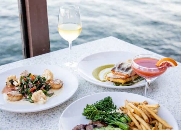 seafood dishes and drinks by the water