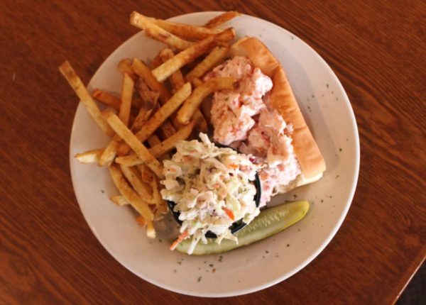 lobster roll with fries and coleslaw