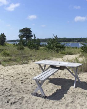 small island with picnic table