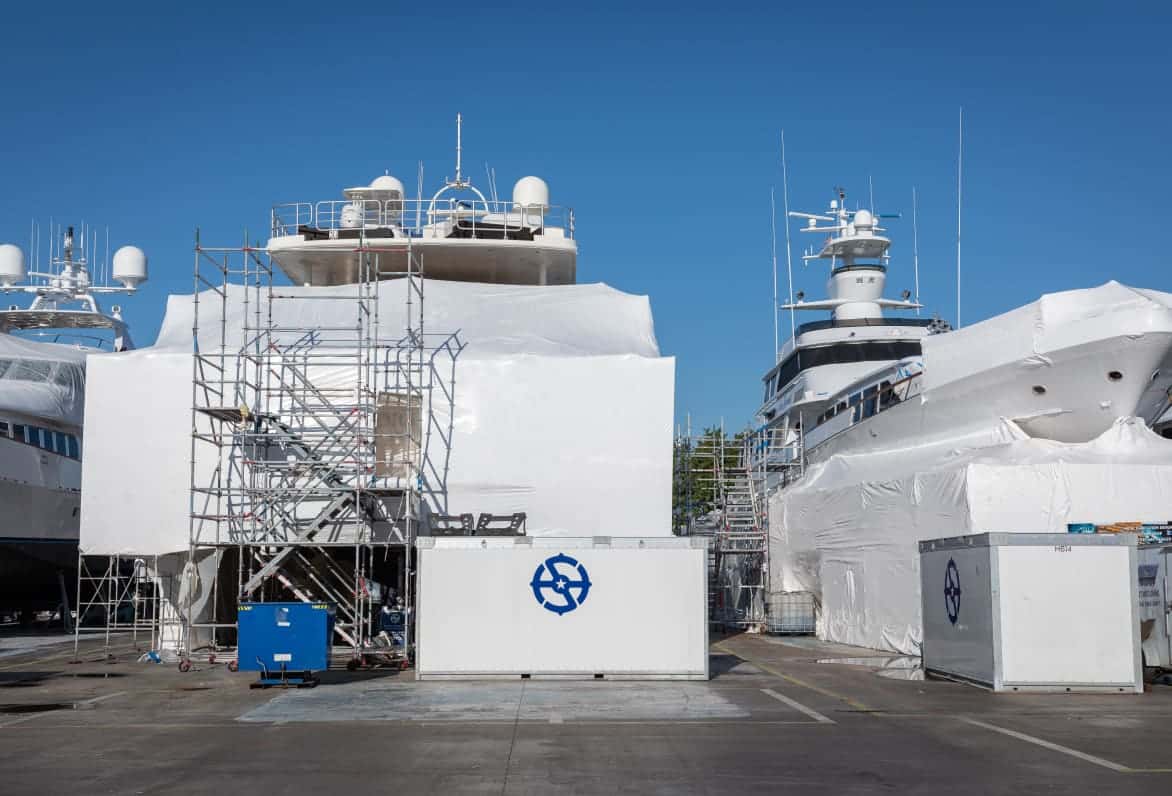 process showing yachts being serviced