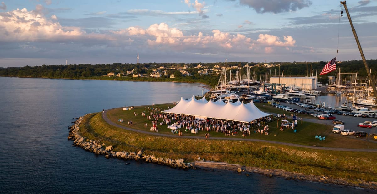 wide view of marina with a white tent