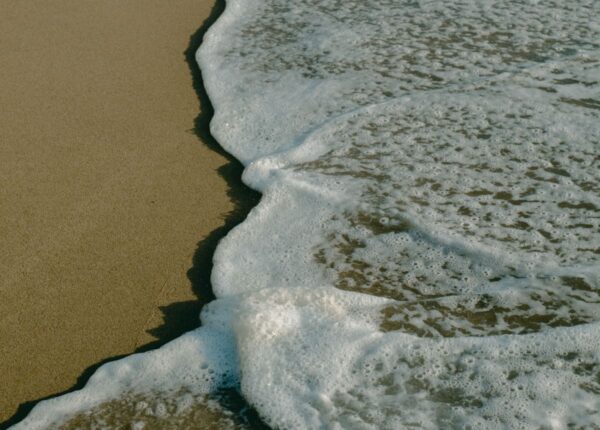 ocean tide washing up on beach