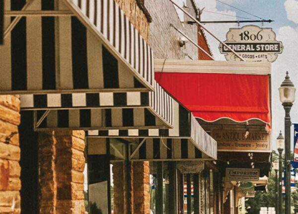 close up of town awnings and signs