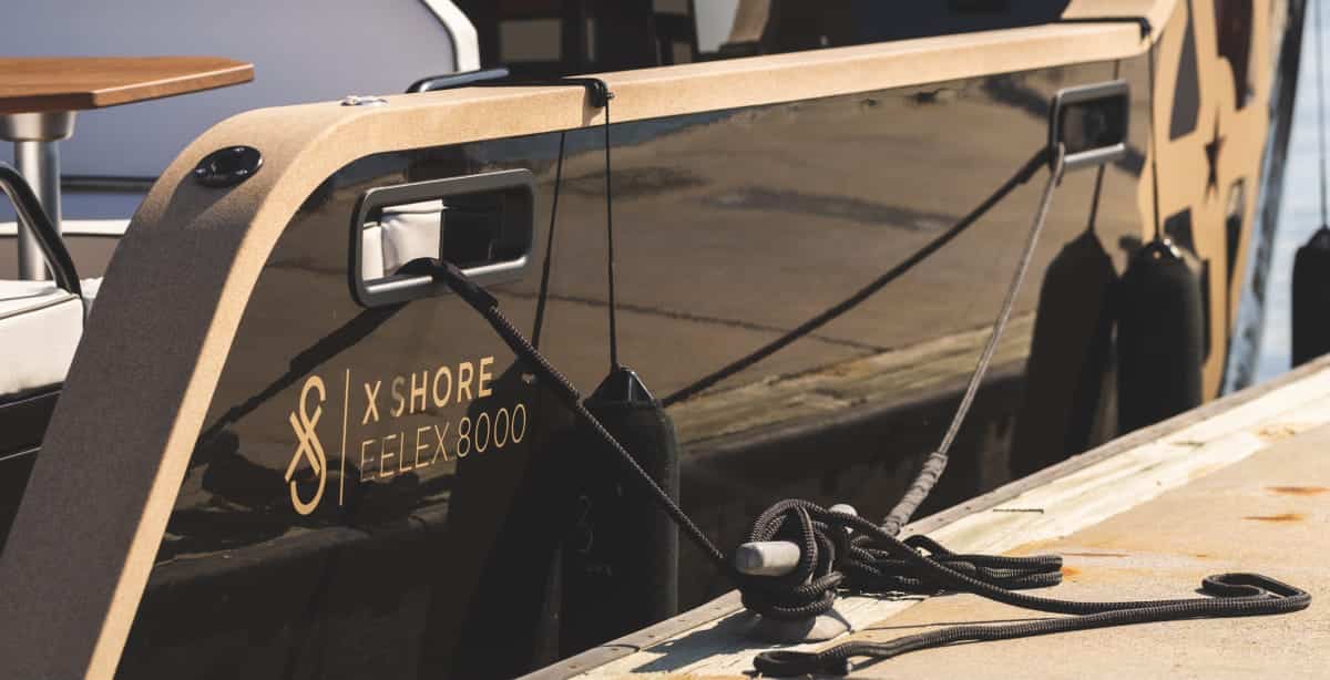 close-up of x shore boat tied up on a dock